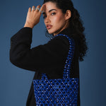 Azura glass beaded shoulder bag in royal blue by MAREN LILIAN