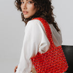Azura glass beaded shoulder bag in red by MAREN LILIAN