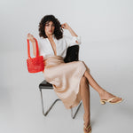 Azura glass beaded shoulder bag in red by MAREN LILIAN