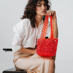 Azura glass beaded shoulder bag in red by MAREN LILIAN