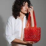 Azura glass beaded shoulder bag in red by MAREN LILIAN
