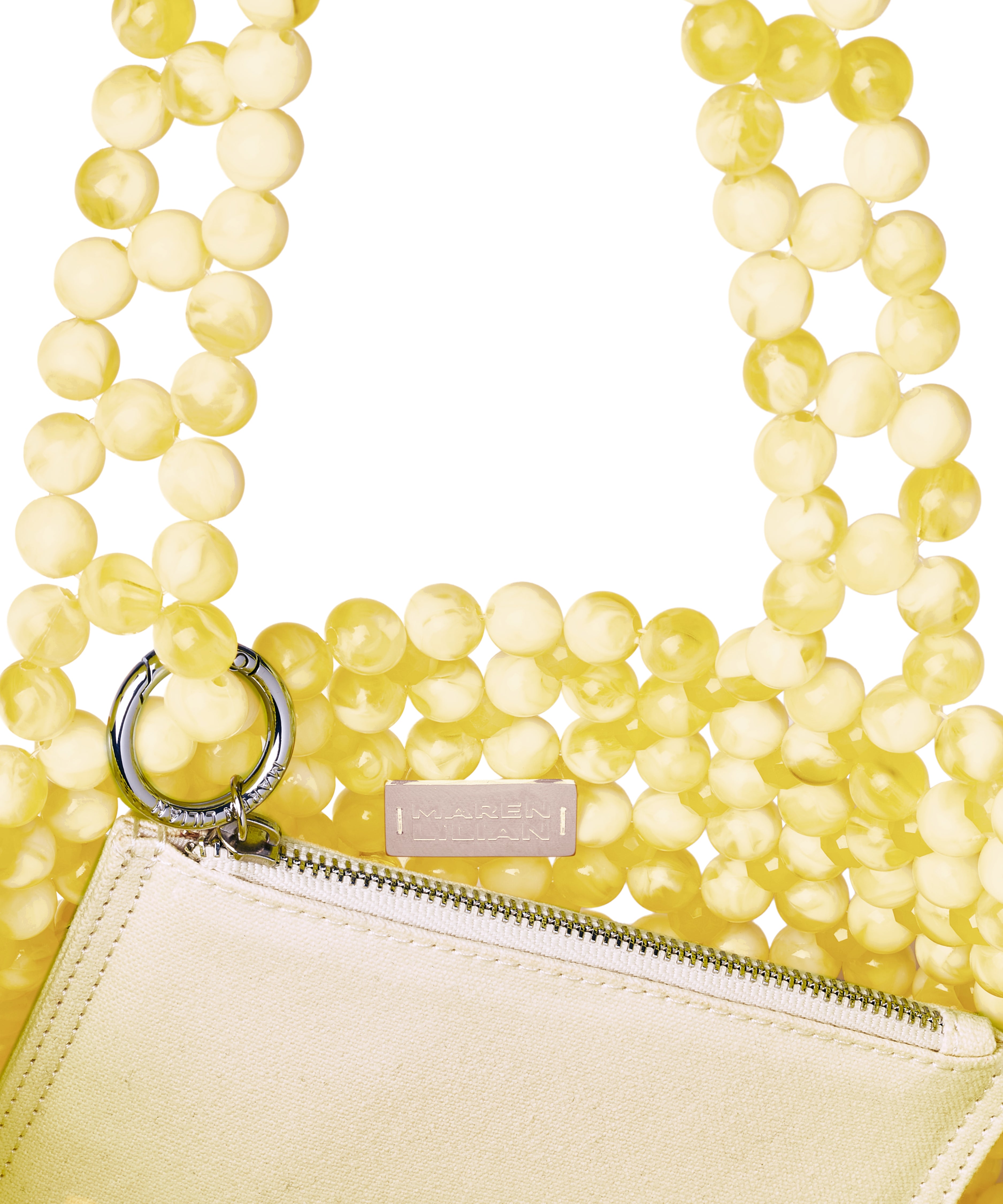 Azura glass beaded shoulder bag in yellow by MAREN LILIAN