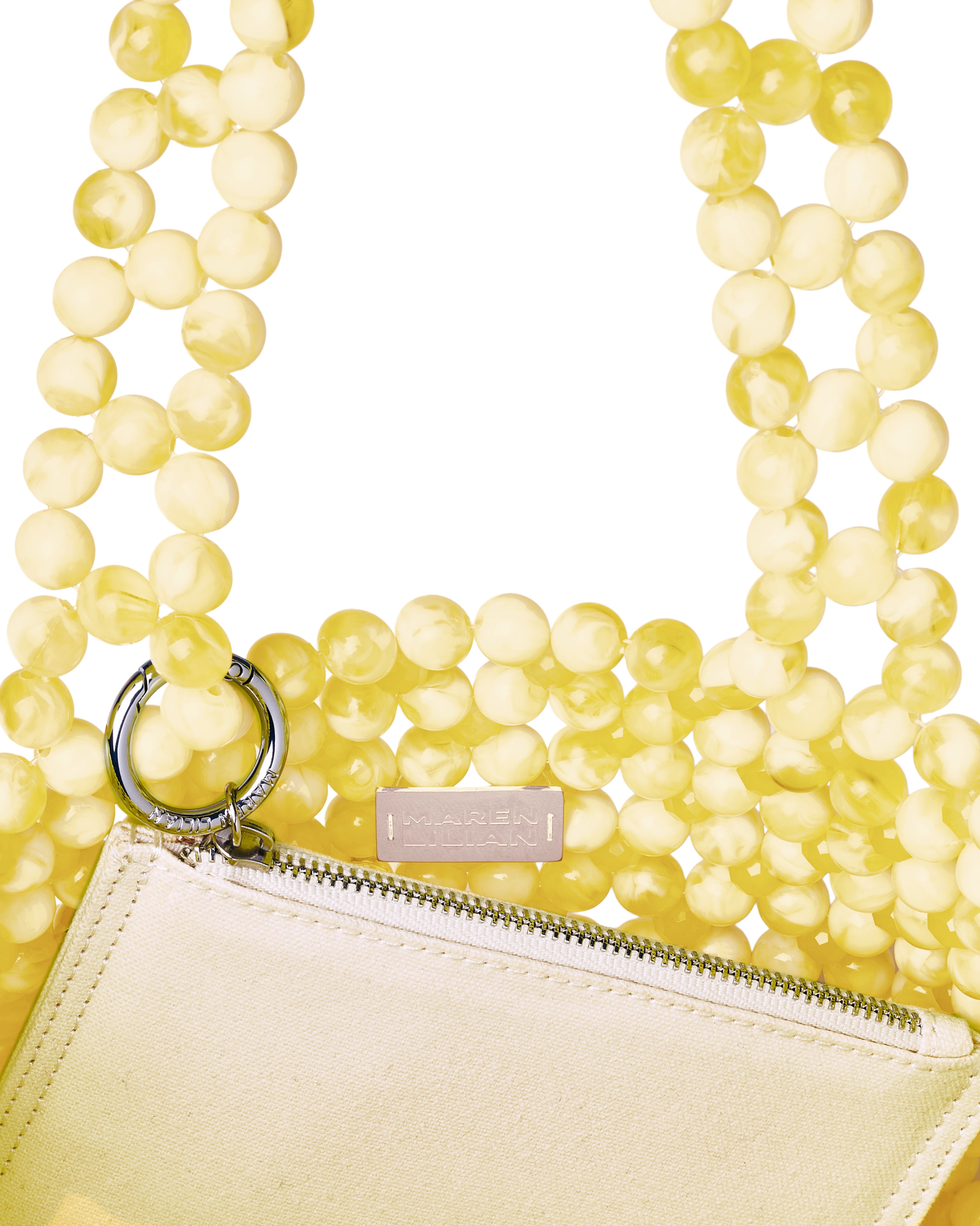 Azura glass beaded shoulder bag in yellow by MAREN LILIAN