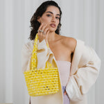 Azura glass beaded shoulder bag in yellow by MAREN LILIAN