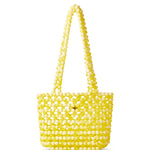 Azura glass beaded shoulder bag in yellow by MAREN LILIAN